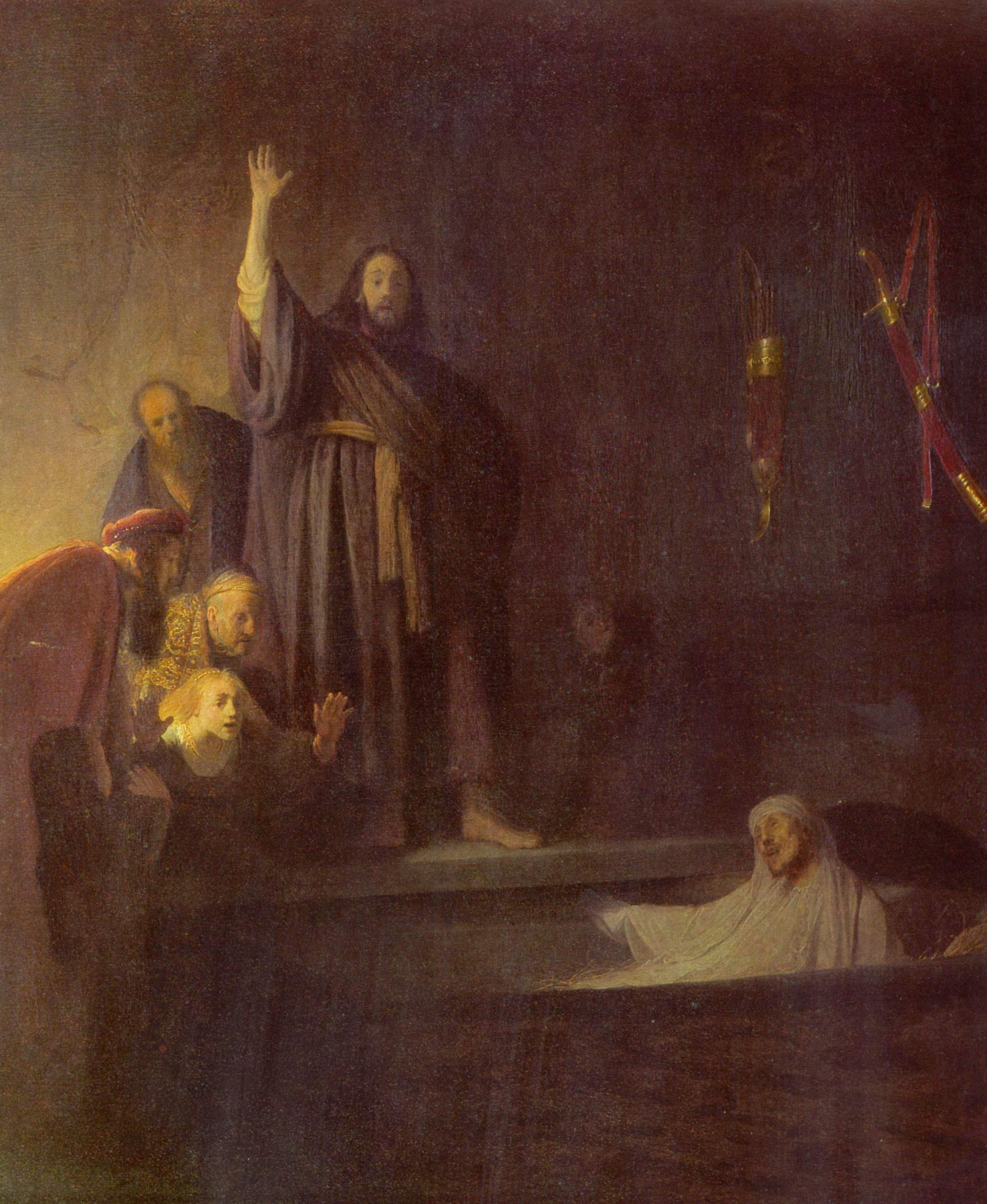 A ressurreição de Lázaro, em óleo de Rembrandt (c. 1630–1632): figura erguida no sepulcro iluminada enquanto Jesus estende o braço ao alto.